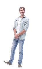 Fototapeta premium in full growth. modern young man in jeans