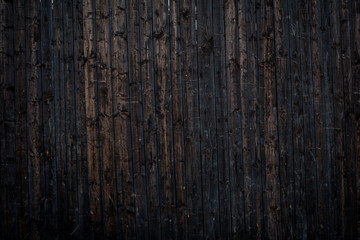Wood vintage background of black painted plank