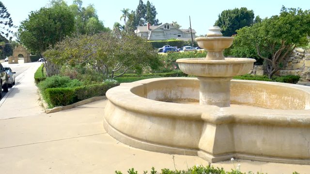 An empty but beautiful fountain in the public Mission Rose Garden in Santa Barbara, California.