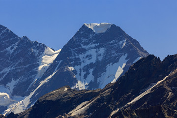 The top of the mountain Nakra Tau with snow and glaciers in the North Caucasus.