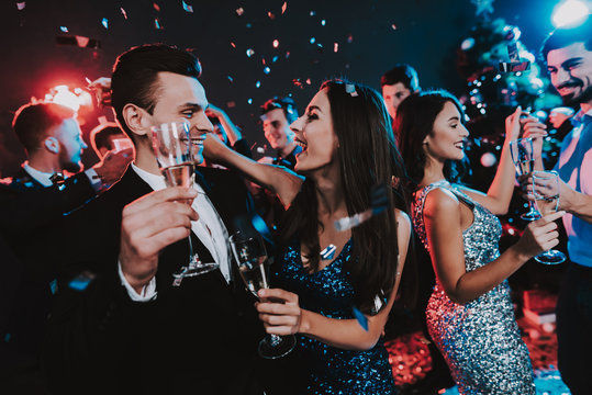 Happy Young People Dancing on New Year Party.