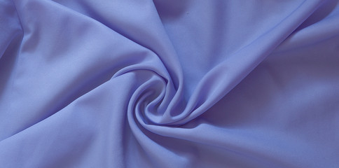 Closeup of rippled purple silk fabric, Beautiful and smooth silk background