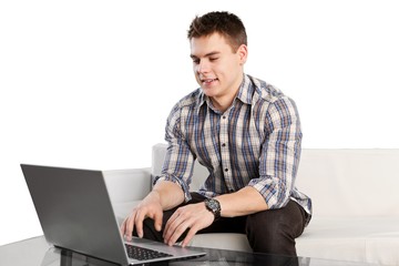 young man using a laptop
