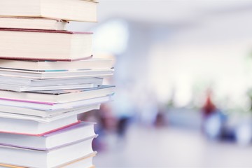 Stack of colorful books on table