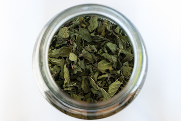 High Angle View of Mint tea in the jar on the white background