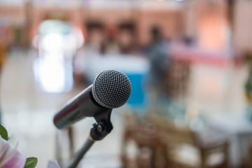 Microphone prepare for speaker speech or speaking seminar room. Talking conference hall light with...