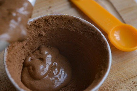 Filling a ramkin with chocolate