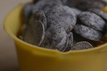 Chocolate in yellow measuring cup