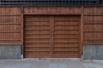 sidewalk by street wall & door