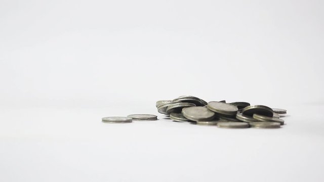 A bunch of Indian old five Rupees coin on white background I Indian currency