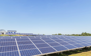            Close up rows array of solar cells or photovoltaics in solar power plant systems convert...