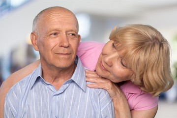 Portrait of happy senior couple smiling in