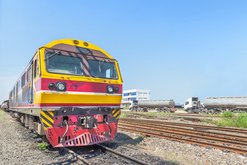 yellow diesel engine locomotive train on railway station 
