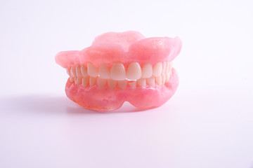 A set of dentures isolated on a white background.