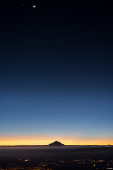 Cayambe and Quito at sunrise