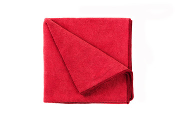 Red napkin isolated on white background.