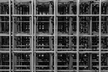 Pile of metal lattices. Abstract black and white image of grid structure 