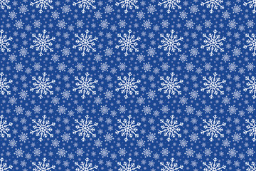White Snowflake seamless pattern on a blue colored background. Various sized snowflakes are repeated through the design for a Christmas or Winter textured effect.