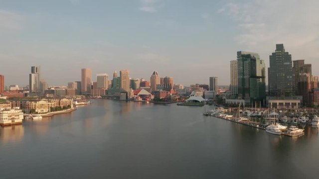 Baltimore Inner Harbor Cinematic Water Aerial during sunrise.  Shot in 4K in H-log for complete color correction capability. Shot on Mavic 2 Pro.