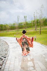 Fototapeta na wymiar Young women wearing traditional Japanese Kimono at Japanese castle