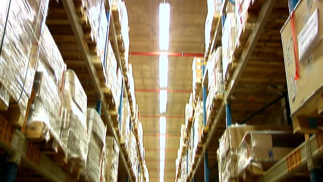 Warehouse with boxes on racks.