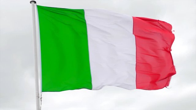 Italian flag fluttering in the wind in slow motion with a white background