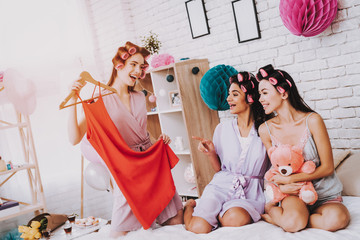 Three Girls with Curlers Looking New Red Dress.