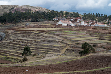 Maras salt evaporation ponds, and the surrounding scenery in sacred valley, Perù.
