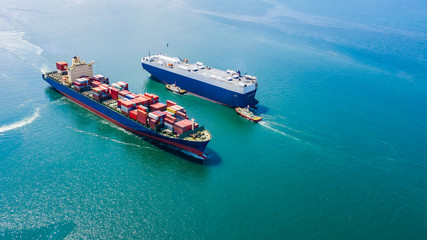 business luxury ship loading cars and shipping cargo containers logistics export import service open sea asia pacific and europe zone aerial view © SHUTTER DIN