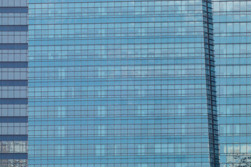 Exterior windows of tall office buildings in city
