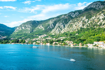 Scenic view of Montenegro Kotor Bay with boats and tall mountains