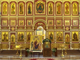 Iconostasis and altar of Russian Orthodox Church. Interior of  Transfiguration Cathedral....