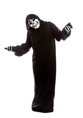 Halloween costume of a skeleton grim reaper wearing a black robe on a white background gesturing...