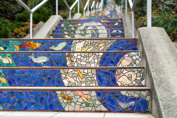 San Francisco, CA, USA - 09/14/2018: The 16th Avenue Tiled Step Folk Art Project in San Francisco. The 16th Avenue Tile Stairs Project is a community collaboration that creates a star-themed mosaic st