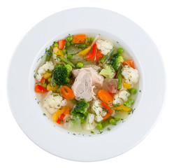 Vegetable soup with chicken. On a white background