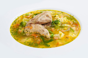 Vegetable soup with chicken. On a white background