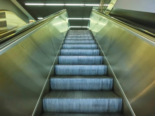 escalator in modern office center or abstract airport