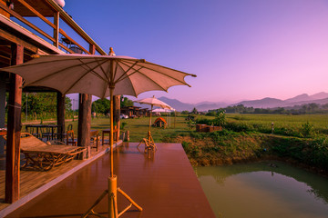 Natural background, near from visible shelter. (Fields, mountains) with colorful sunshine, beautiful natural, mostly seen in the countryside and tourist attractions.