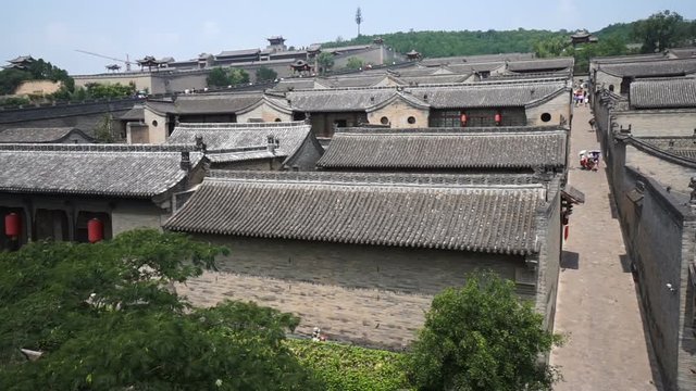 Shanxi,China-Aug 12,2018: Panoramic view of the Wang Family Courtyard and visitors, Shanxi province, China