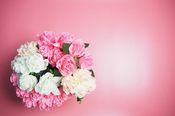 Rose flowers are on a pink background. Valentines Day Background.