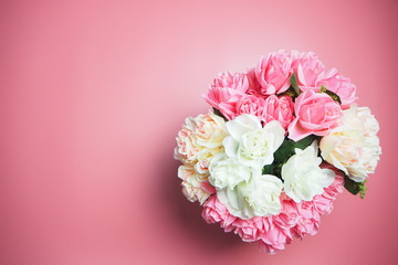Rose flowers are on a pink background. Valentines Day Background.