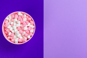 Marshmallows on blue background