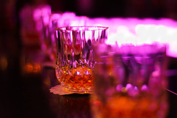 Glasses of Scotch whiskey in a bar
