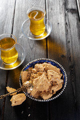 Tasty halva with tea on the table