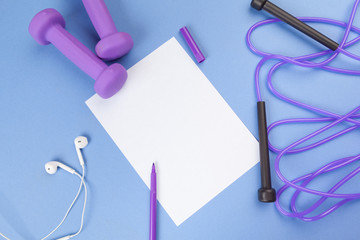 Mockup clipboard with Gym equipment dumbbell on blue background