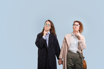 Two cute charming young stylish girls students