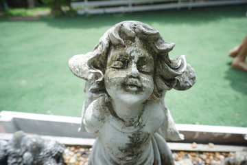 Fototapeta na wymiar Statue in the garden.
