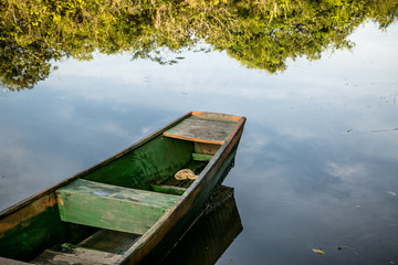 Rustic wooden boats in lagoon in Marimbus Swamp in the Chapada Diamantina in Brazil