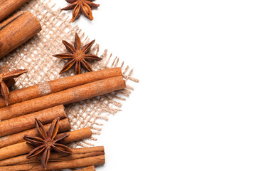 Cinnamon sticks and star anise isolated on white background