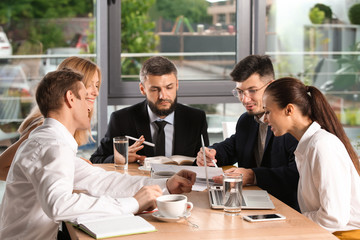 Meeting of business team working in office